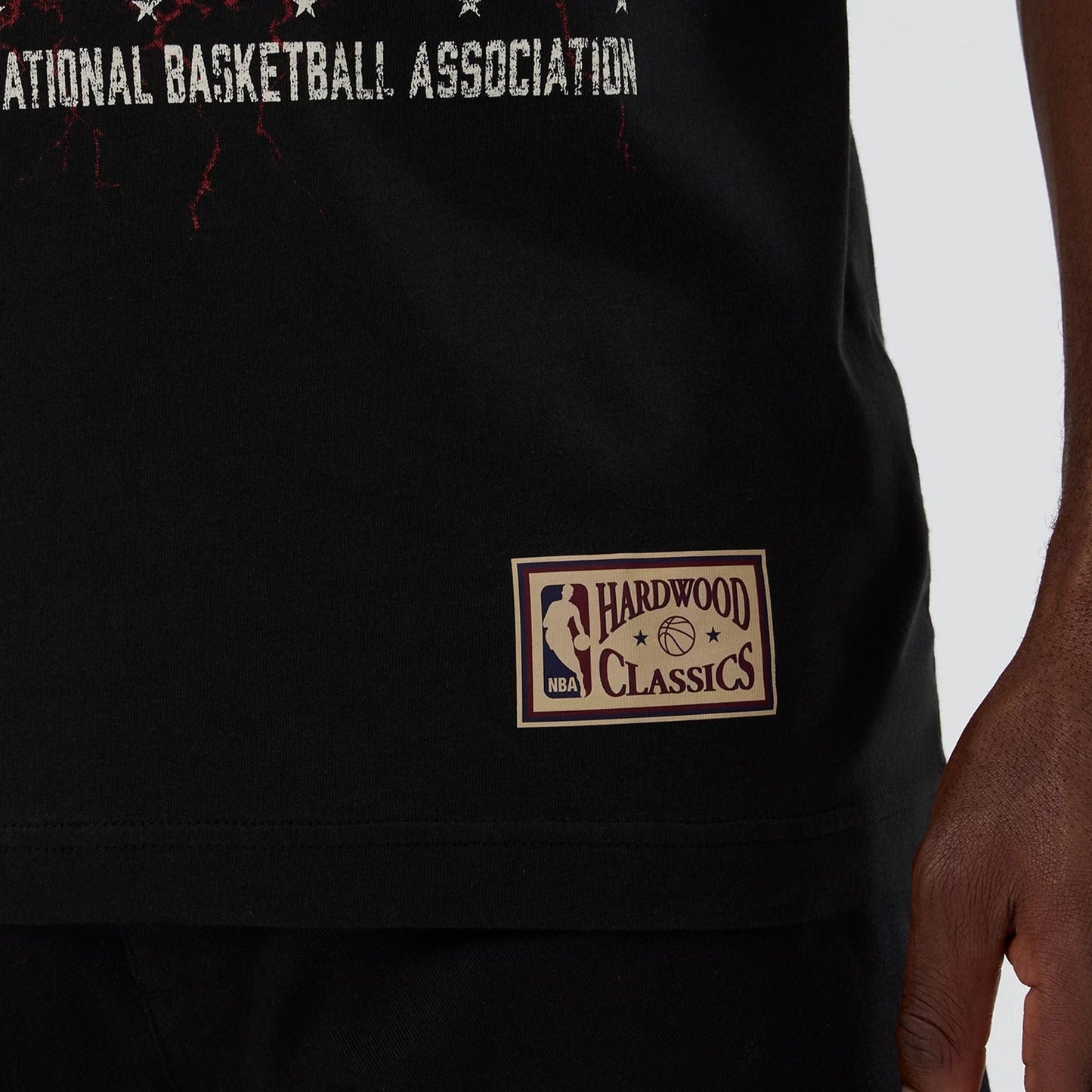 The model is wearing this NBA Hardwood Classic Chicago Bulls T-Shirt in black. 5