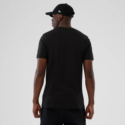 The model is wearing this NBA Hardwood Classic Boston Celtics T-Shirt in black. 2