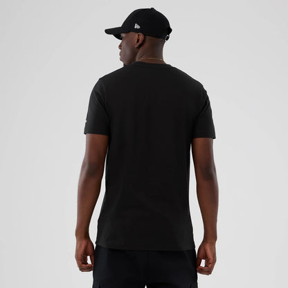 The model is wearing this NBA Hardwood Classic Boston Celtics T-Shirt in black. 2