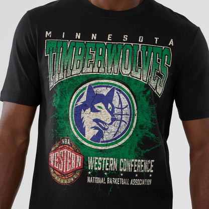 New Era Minnesota Timberwolves NBA Hardwood Classic Black T-Shirt, front view showing a distressed Timberwolves logo with green and blue graphics and vintage-style lettering, worn by a model.