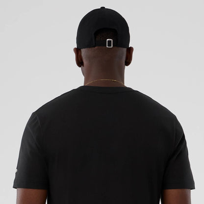 The model is wearing this NBA Hardwood Classic Milwaukee Bucks T-Shirt in black. 6