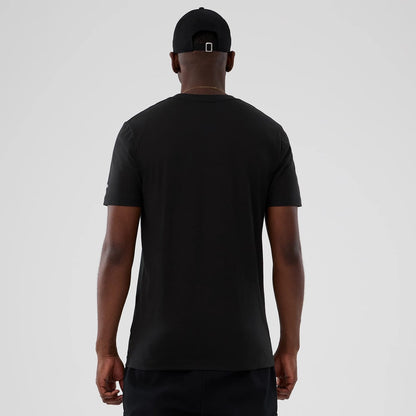 The model is wearing this NBA Hardwood Classic Milwaukee Bucks T-Shirt in black. 2