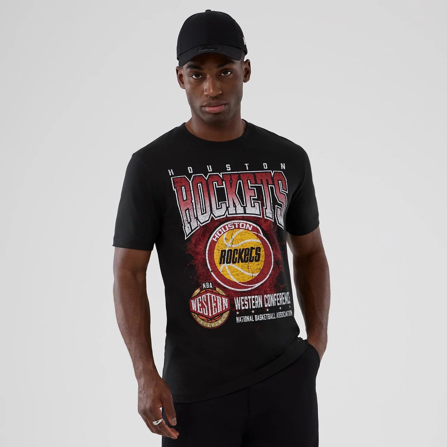 The model is wearing this NBA Hardwood Classic Houston Rockets T-Shirt in black. 1