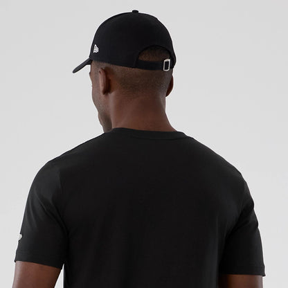 The model is wearing this NBA Hardwood Classic Houston Rockets T-Shirt in black. 7