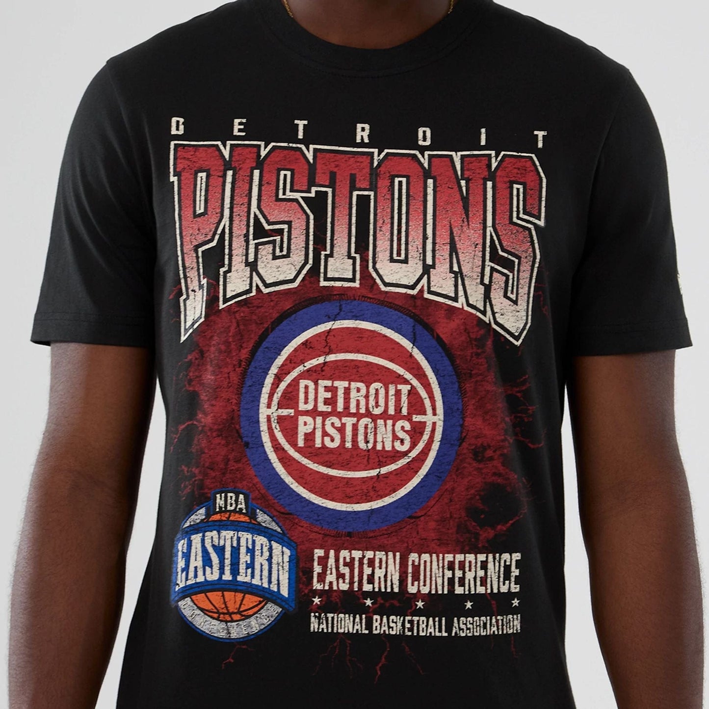 The model is wearing this NBA Hardwood Classic Detroit Pistons T-Shirt in black. 3