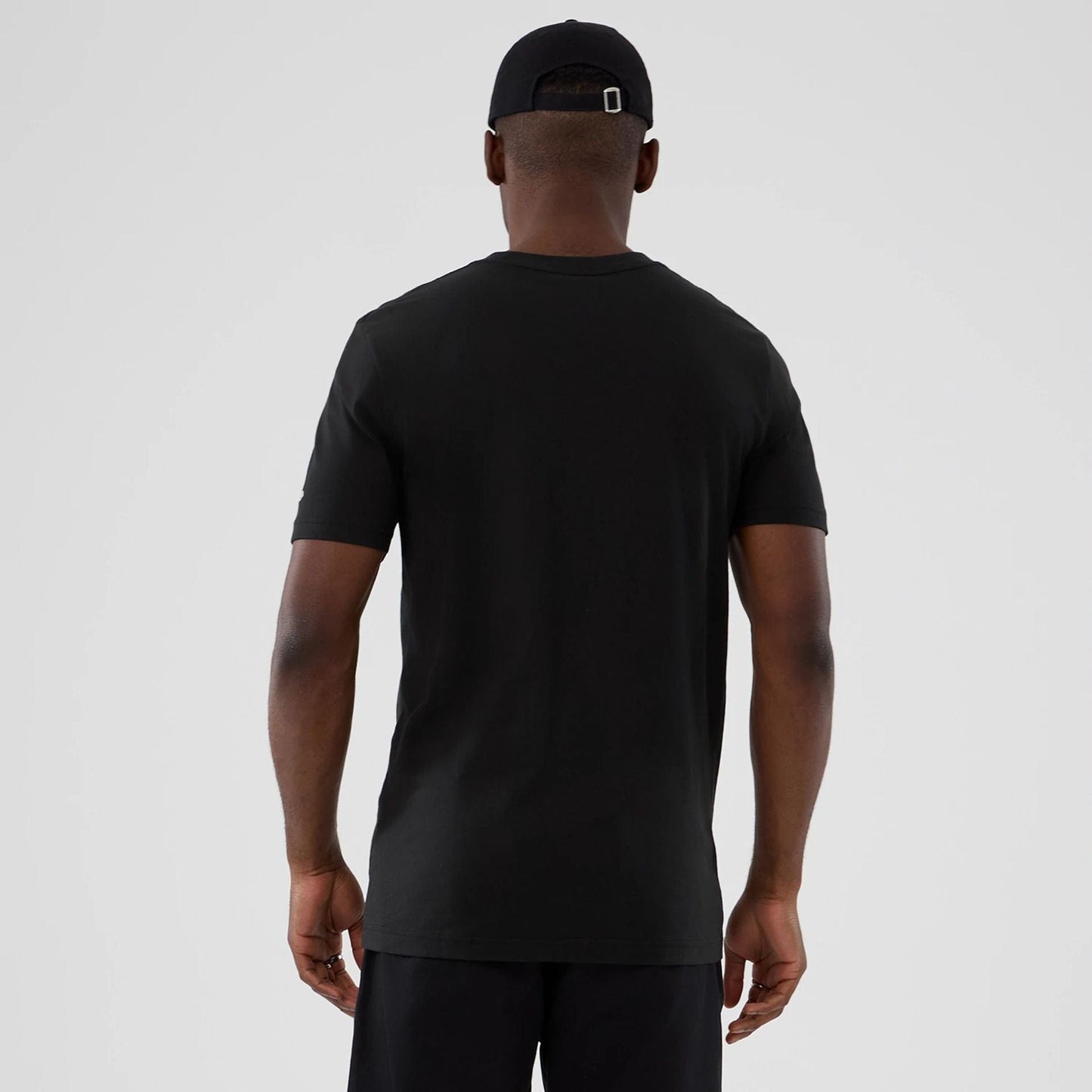 The model is wearing this NBA Hardwood Classic Denver Nuggets T-Shirt in black. 2