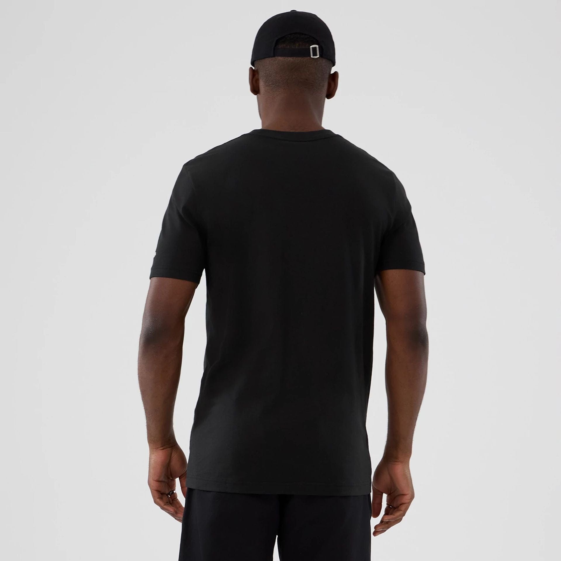 The model is wearing this NBA Hardwood Classic Denver Nuggets T-Shirt in black. 2