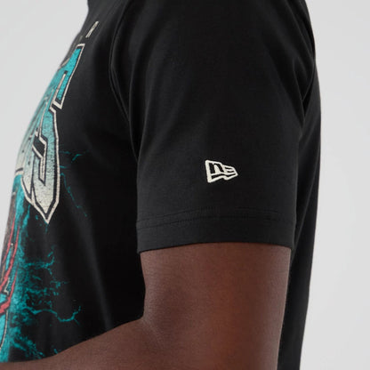 The model is wearing this NBA Hardwood Classic Vancouver Grizzlies T-Shirt in black. 4
