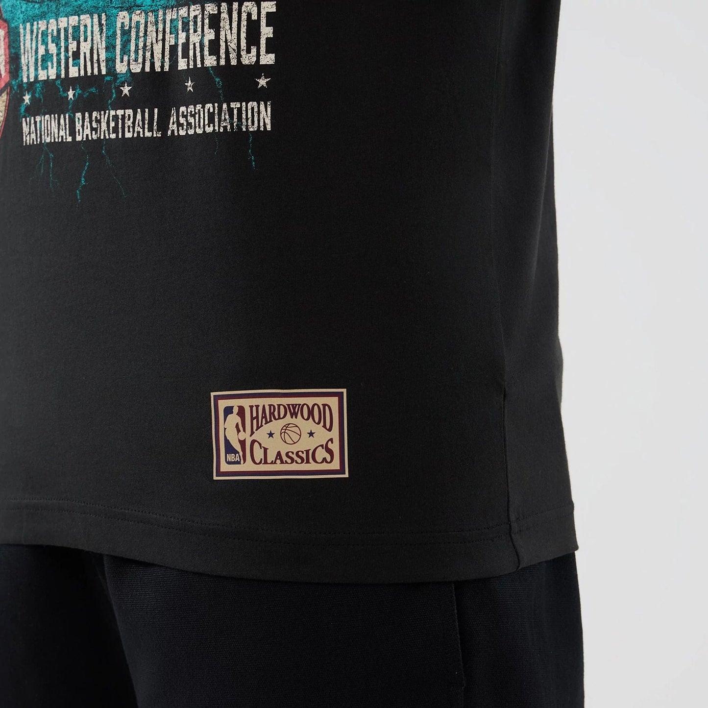 The model is wearing this NBA Hardwood Classic Vancouver Grizzlies T-Shirt in black. 5