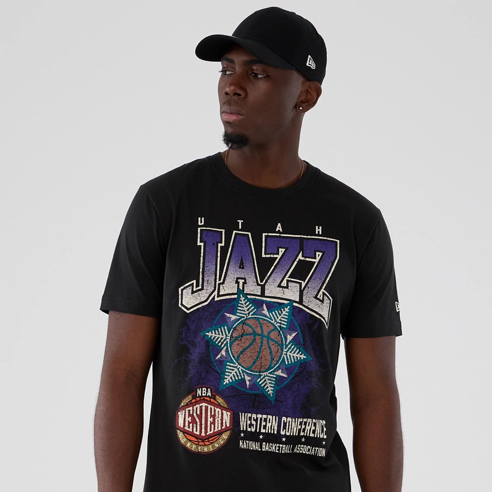 The model is wearing this NBA Hardwood Classic Utah Jazz T-Shirt in black. 7