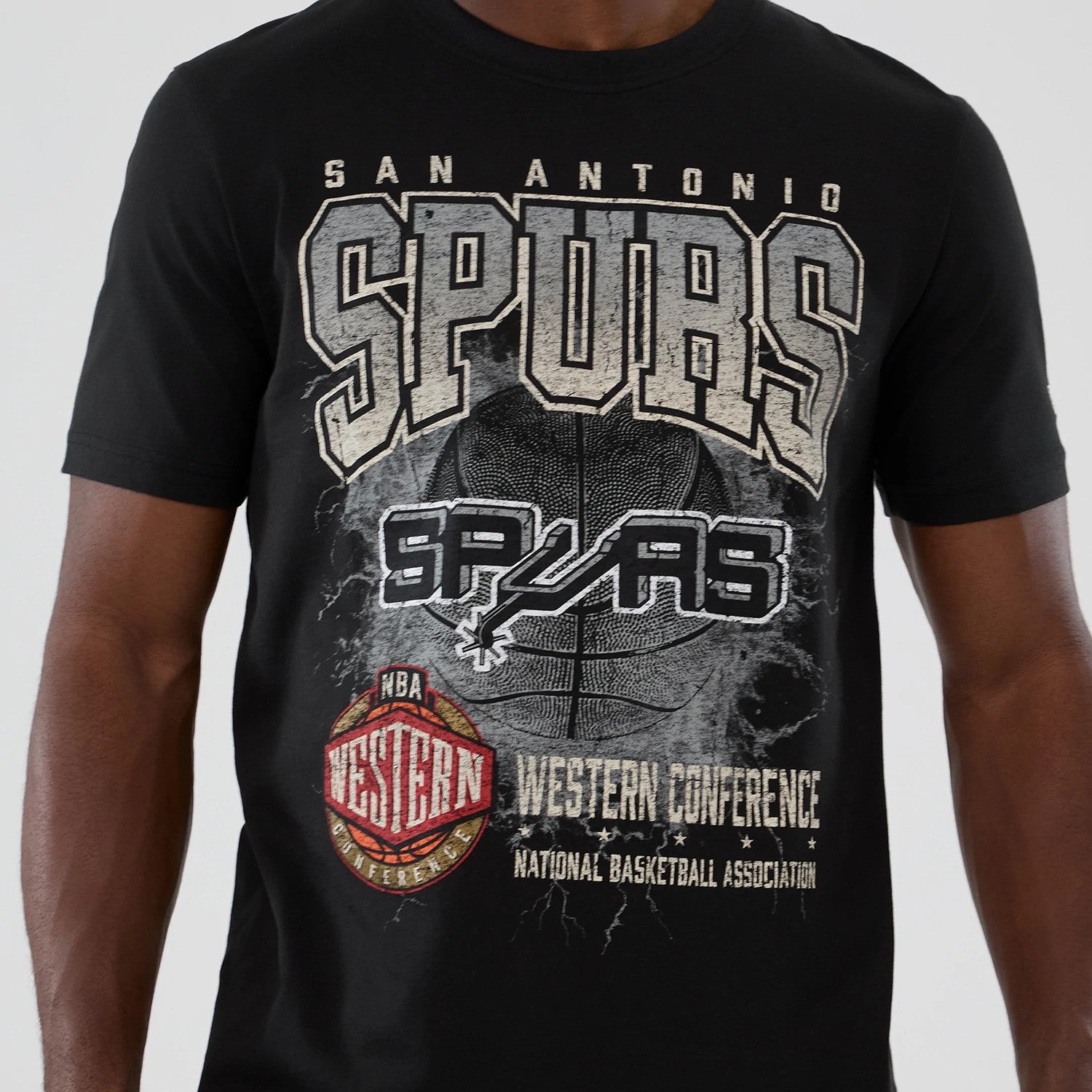 The model is wearing this NBA Hardwood Classic San Antonio Spurs T-Shirt in black. 4