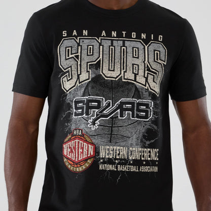 The model is wearing this NBA Hardwood Classic San Antonio Spurs T-Shirt in black. 4