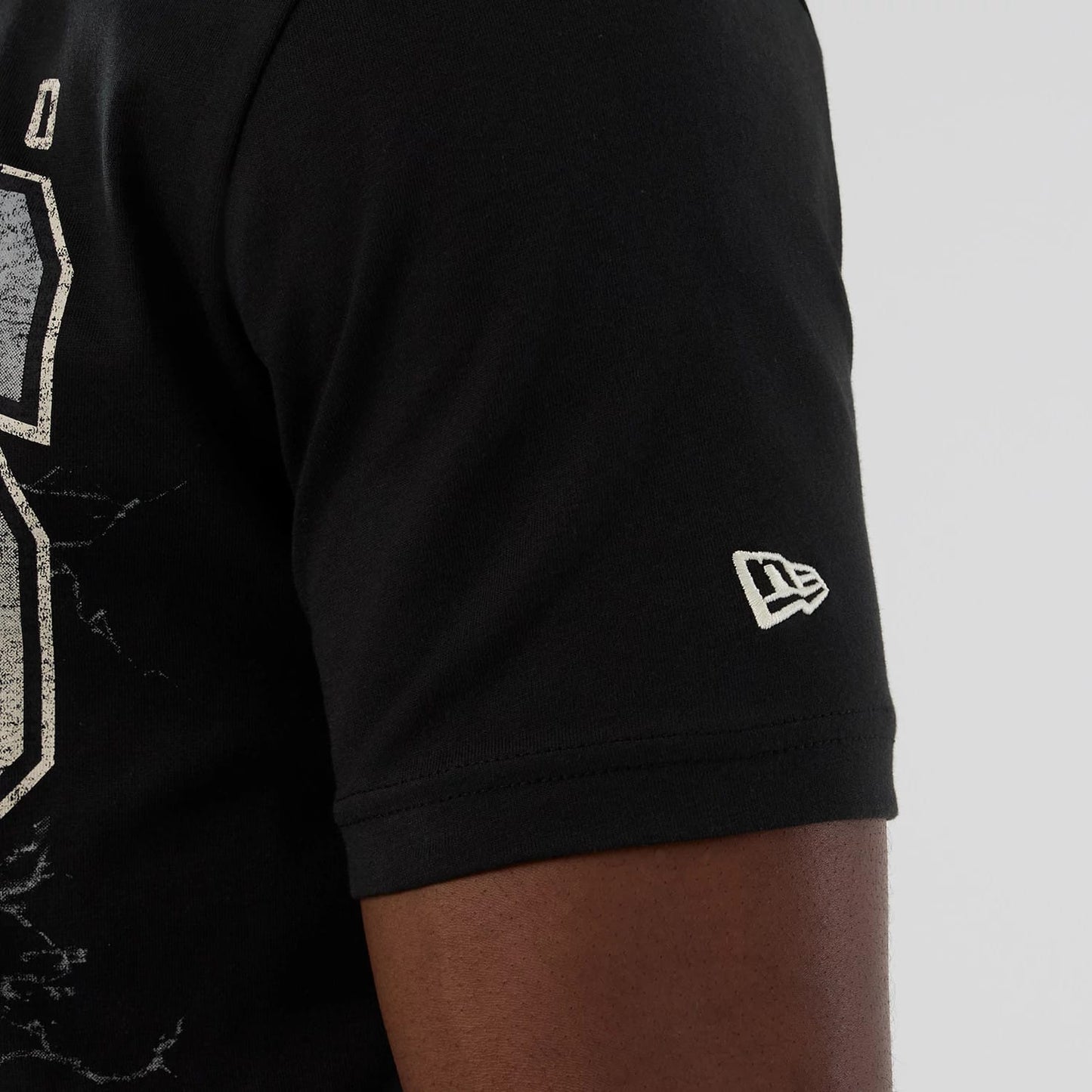 The model is wearing this NBA Hardwood Classic San Antonio Spurs T-Shirt in black. 5