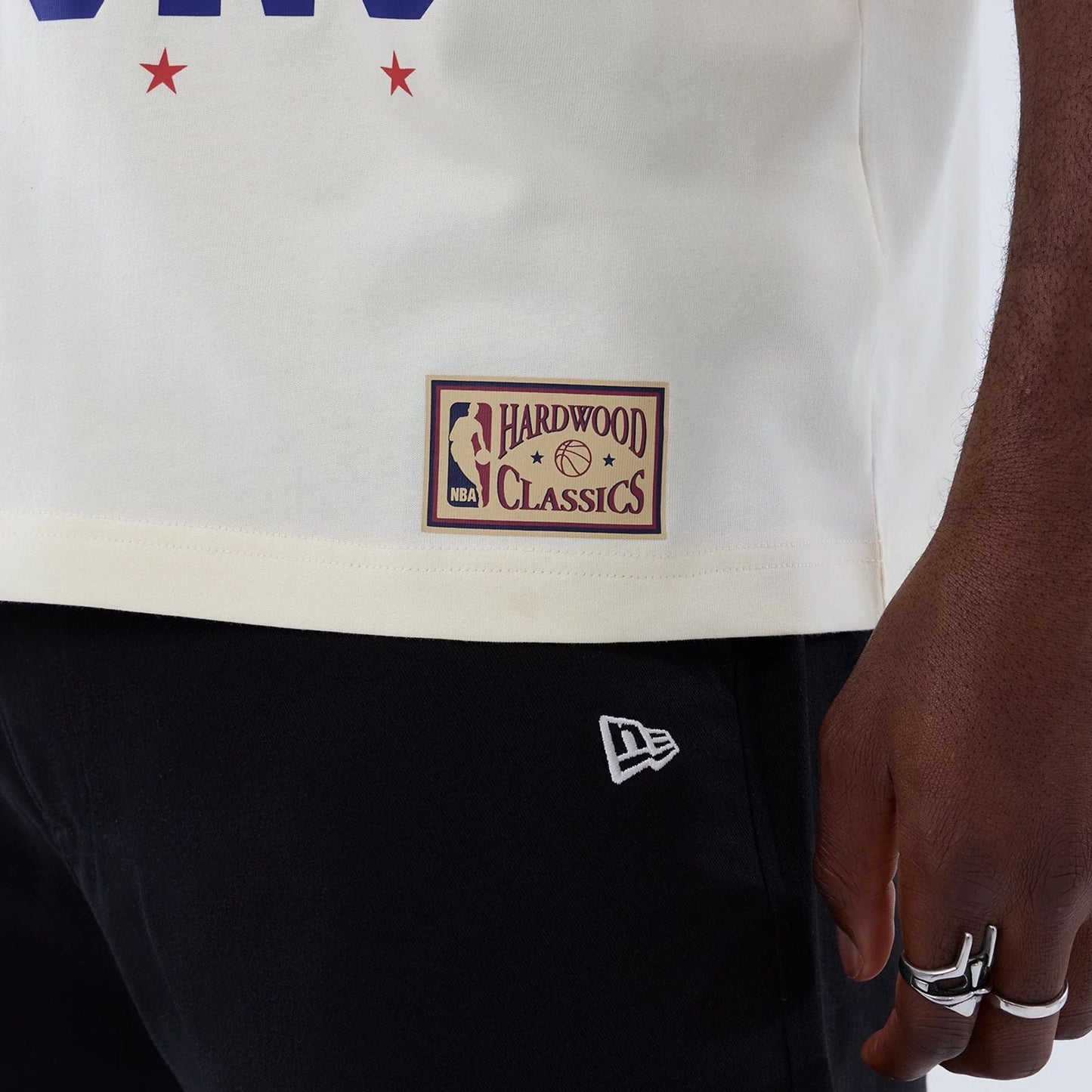 The model is wearing this NBA Hardwood Classic Detroit Pistons T-Shirt in cream. 5