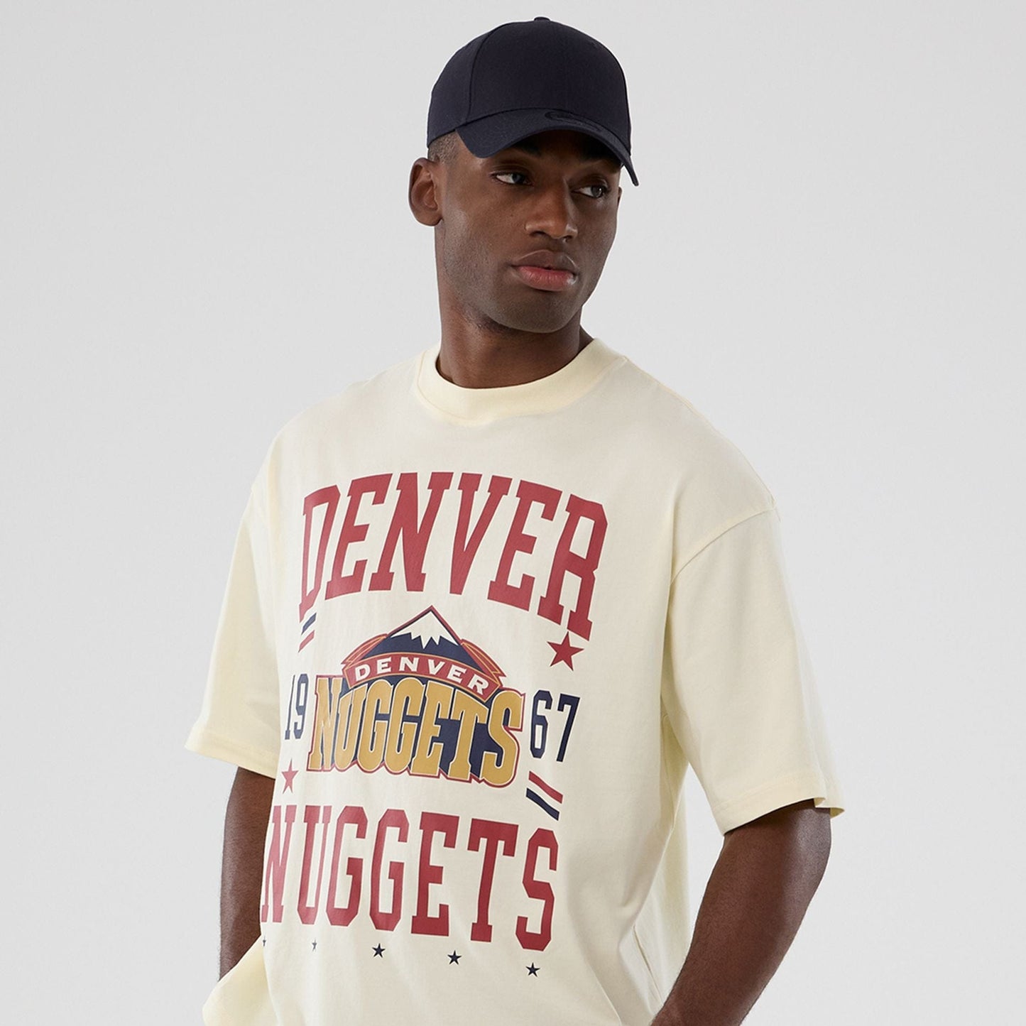 The model is wearing this NBA Hardwood Classic Denver Nuggets T-Shirt in white. 6