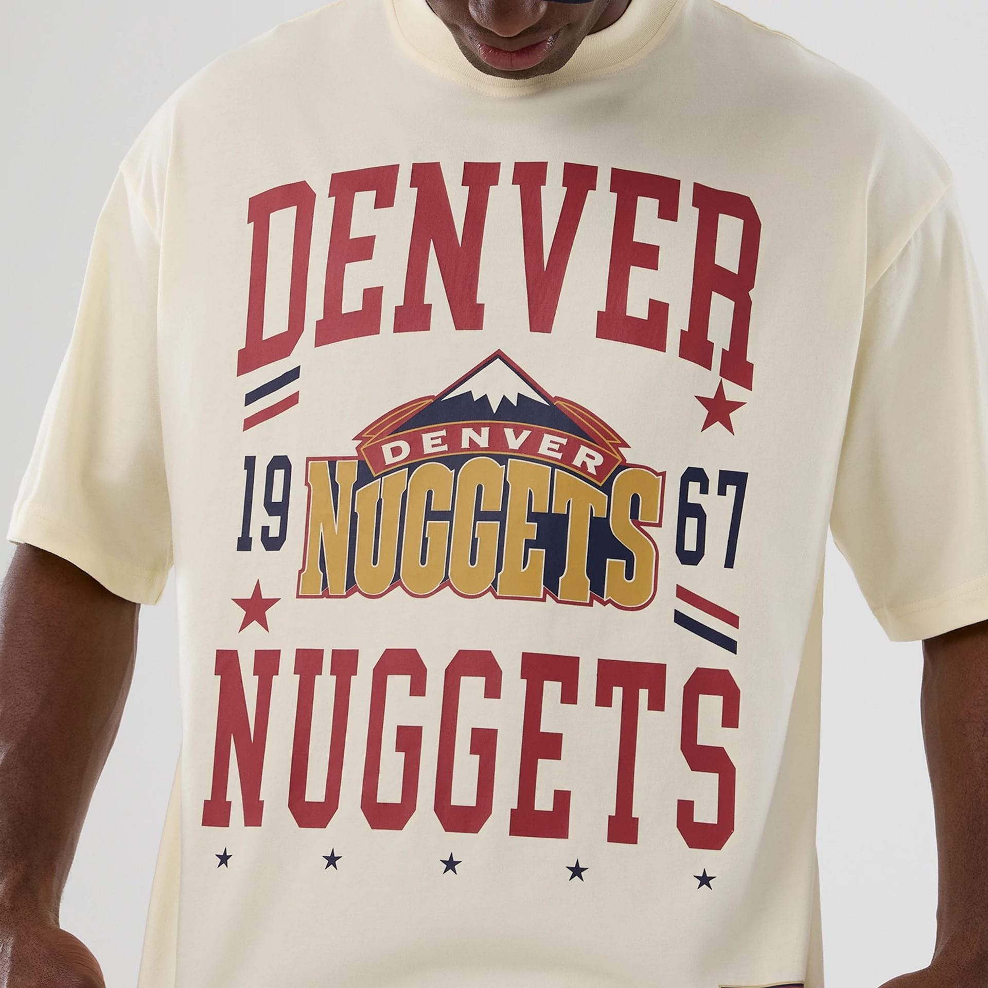 The model is wearing this NBA Hardwood Classic Denver Nuggets T-Shirt in white. 3