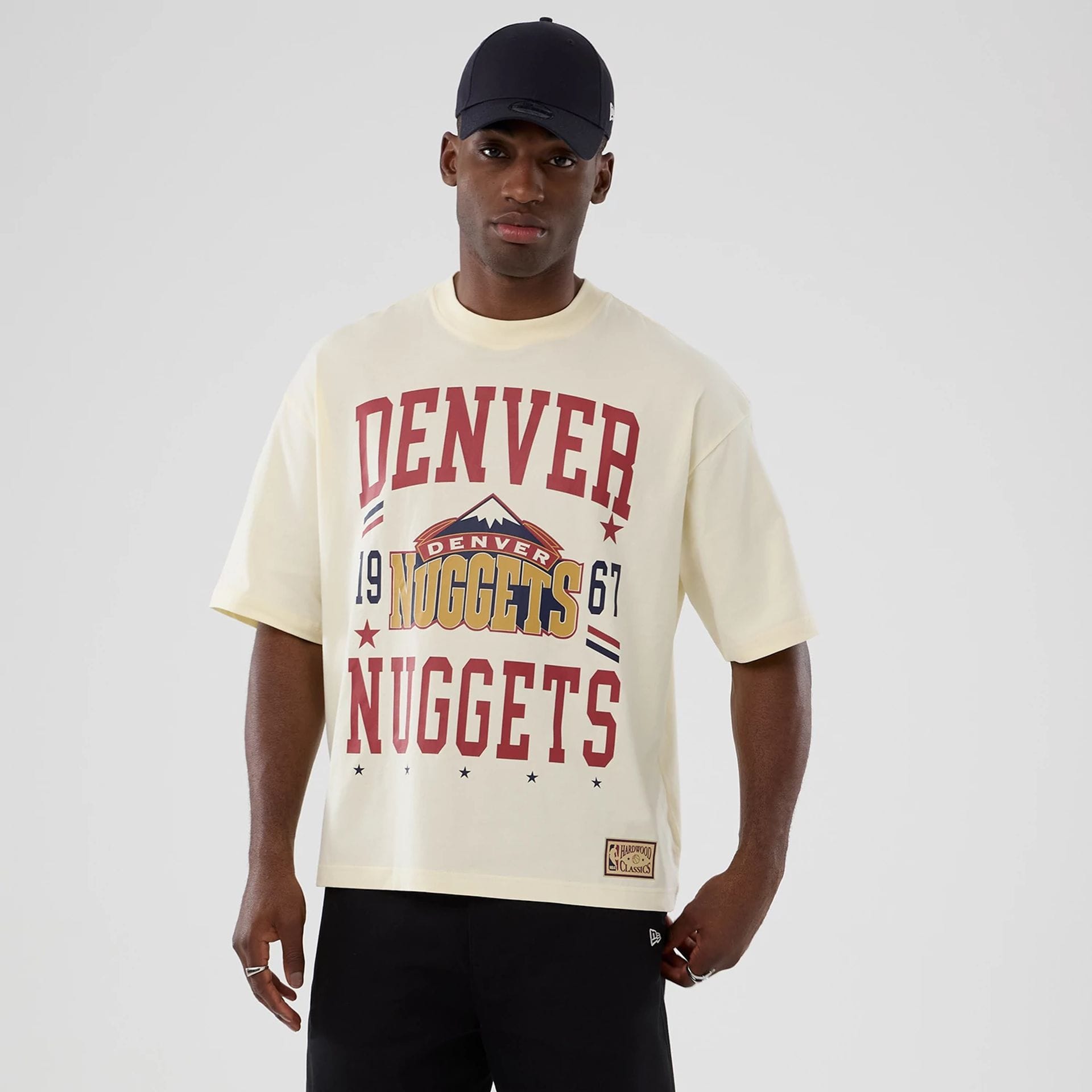 The model is wearing this NBA Hardwood Classic Denver Nuggets T-Shirt in white. 1
