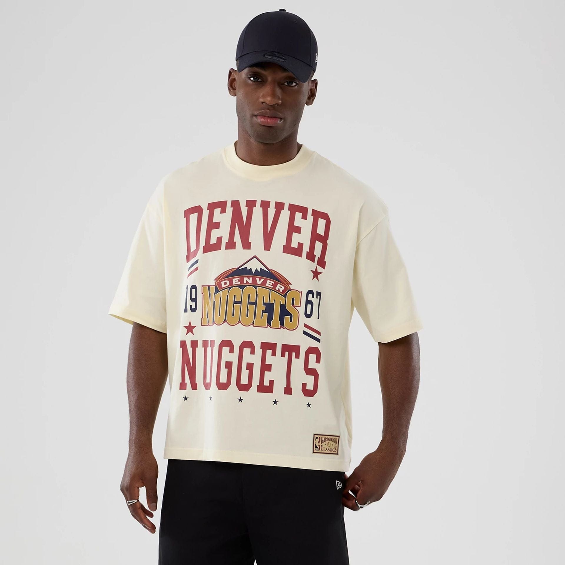 The model is wearing this NBA Hardwood Classic Denver Nuggets T-Shirt in white. 1