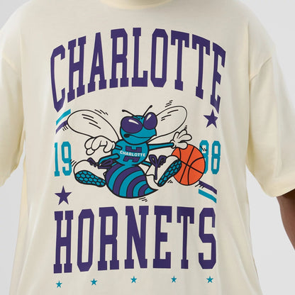 The model is wearing this NBA Hardwood Classic Charlotte Hornets T-Shirt in cream. 3