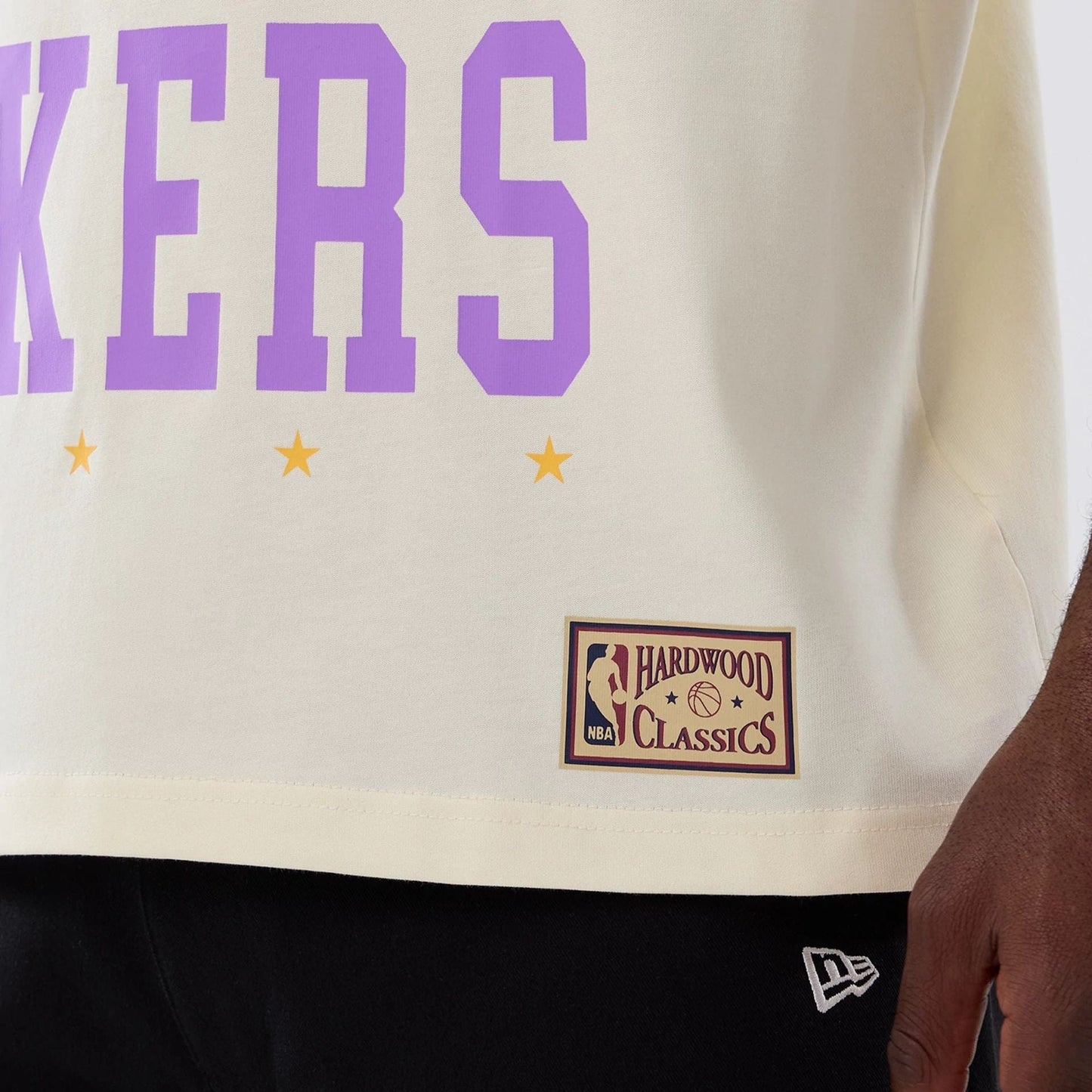 The model is wearing this NBA Hardwood Classic LA Lakers T-Shirt in cream. 5