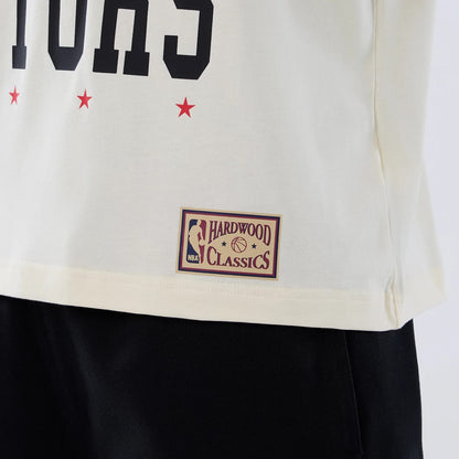 The model is wearing this NBA Hardwood Classic Toronto Raptors T-Shirt in Cream . 5