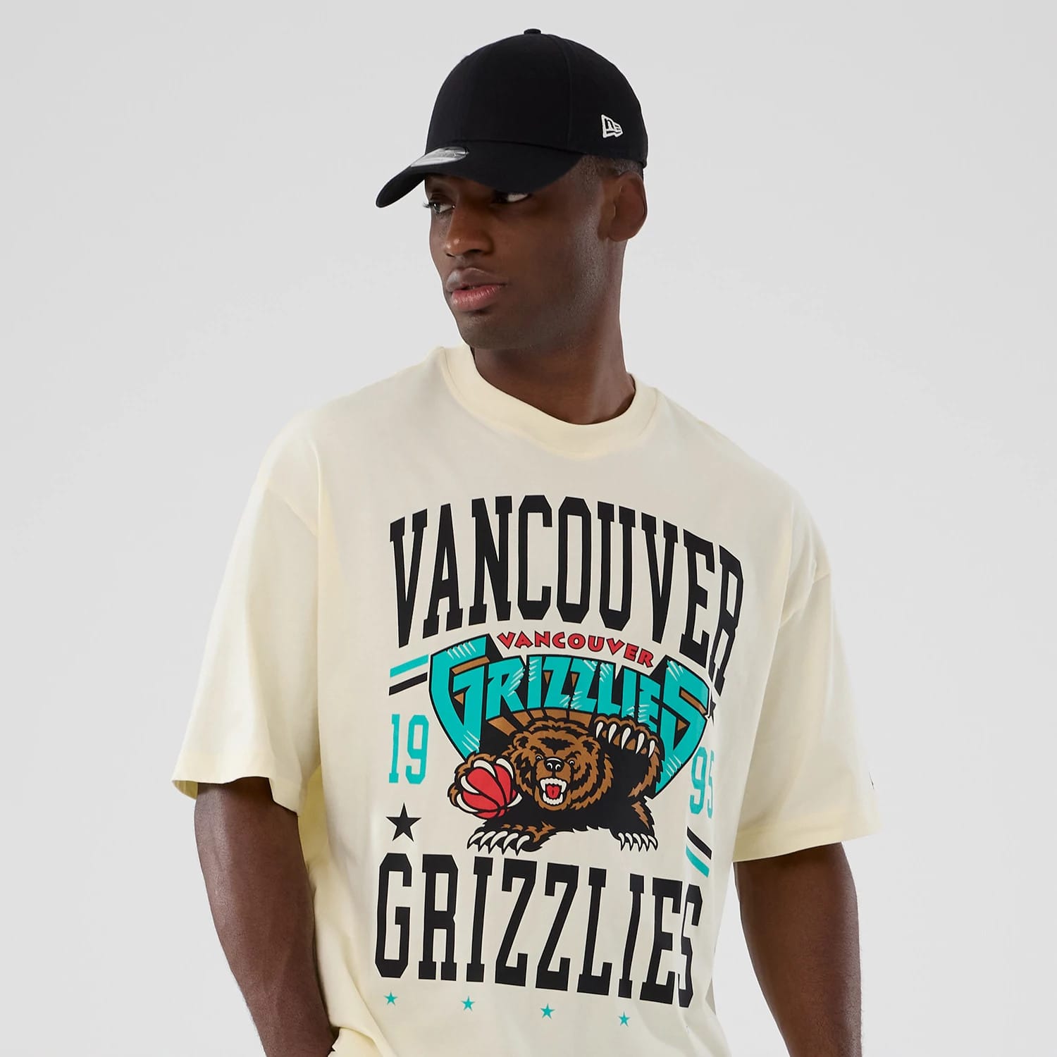 The model is wearing this NBA Hardwood Classic Vancouver Grizzlies T-Shirt in Cream. 6
