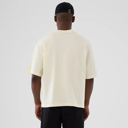 The model is wearing this NBA Hardwood Classic Vancouver Grizzlies T-Shirt in Cream. 2