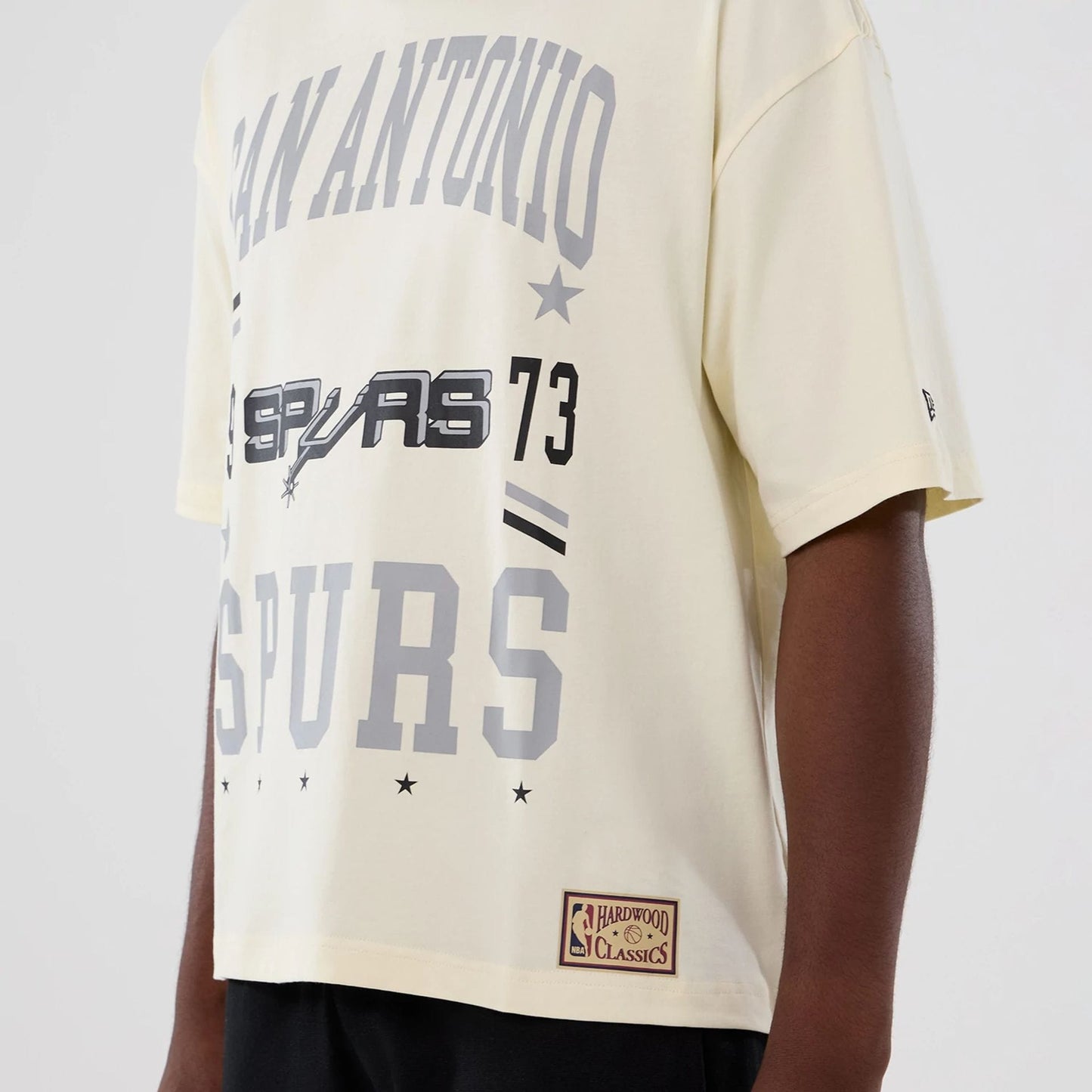 The model is wearing this NBA Hardwood Classic San Antonio Spurs T-Shirt in Cream . 3