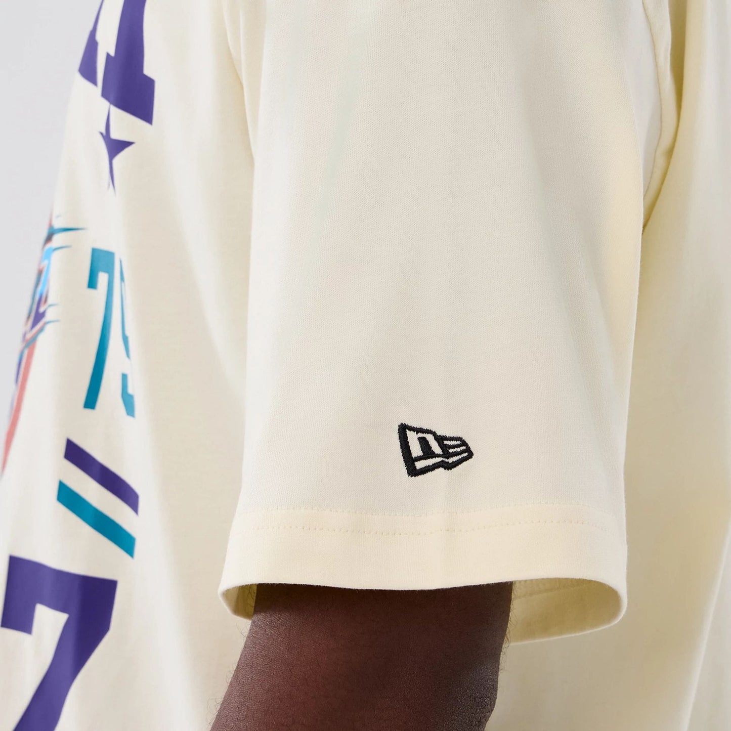 The model is wearing this NBA Hardwood Classic Utah Jazz T-Shirt in Cream. 4