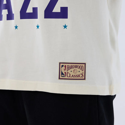 The model is wearing this NBA Hardwood Classic Utah Jazz T-Shirt in Cream. 5