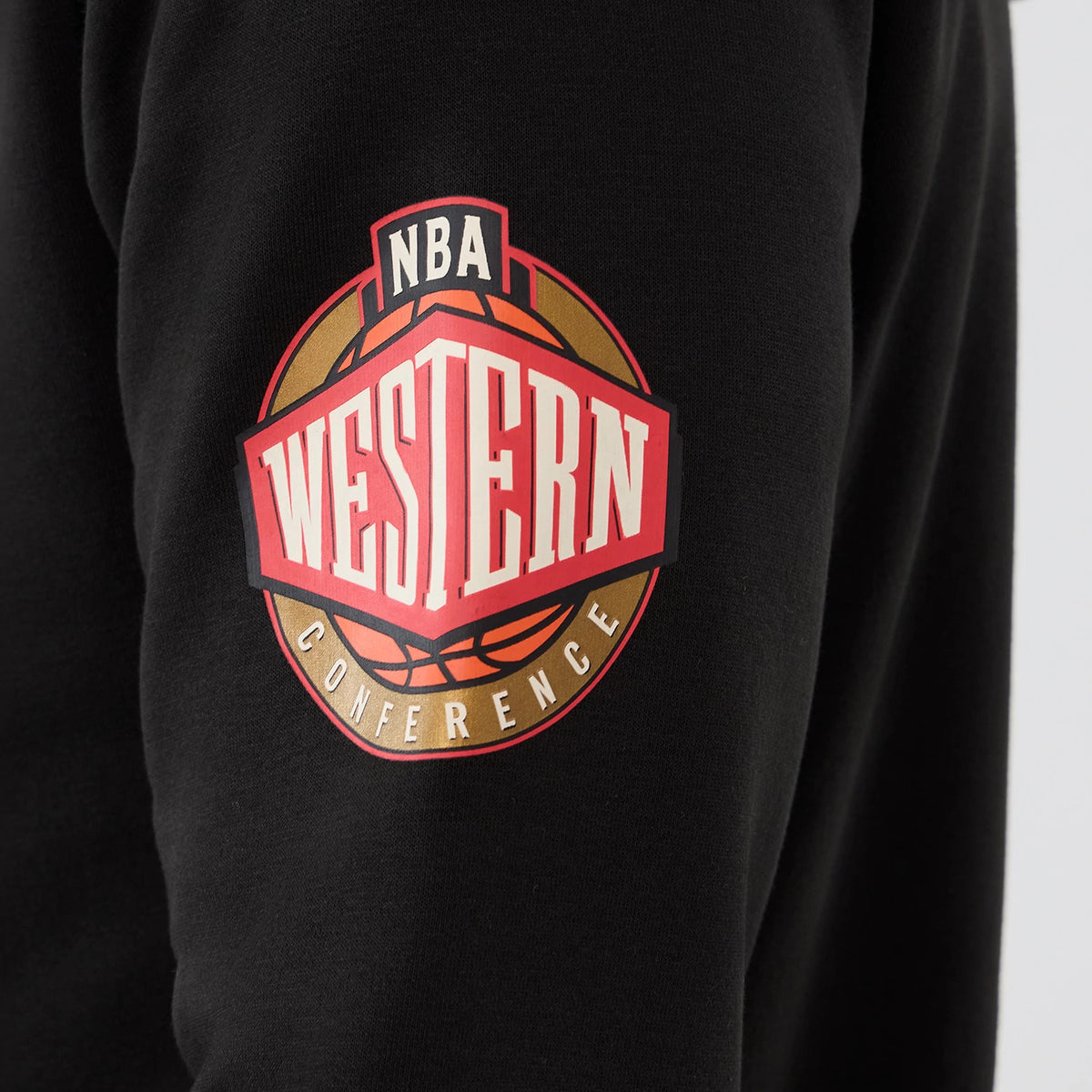 New Era LA Lakers NBA Hardwood Classic Black Pullover Hoodie, side view showing a prominently printed NBA Western Conference logo in red and gold on the sleeve of the black hoodie.