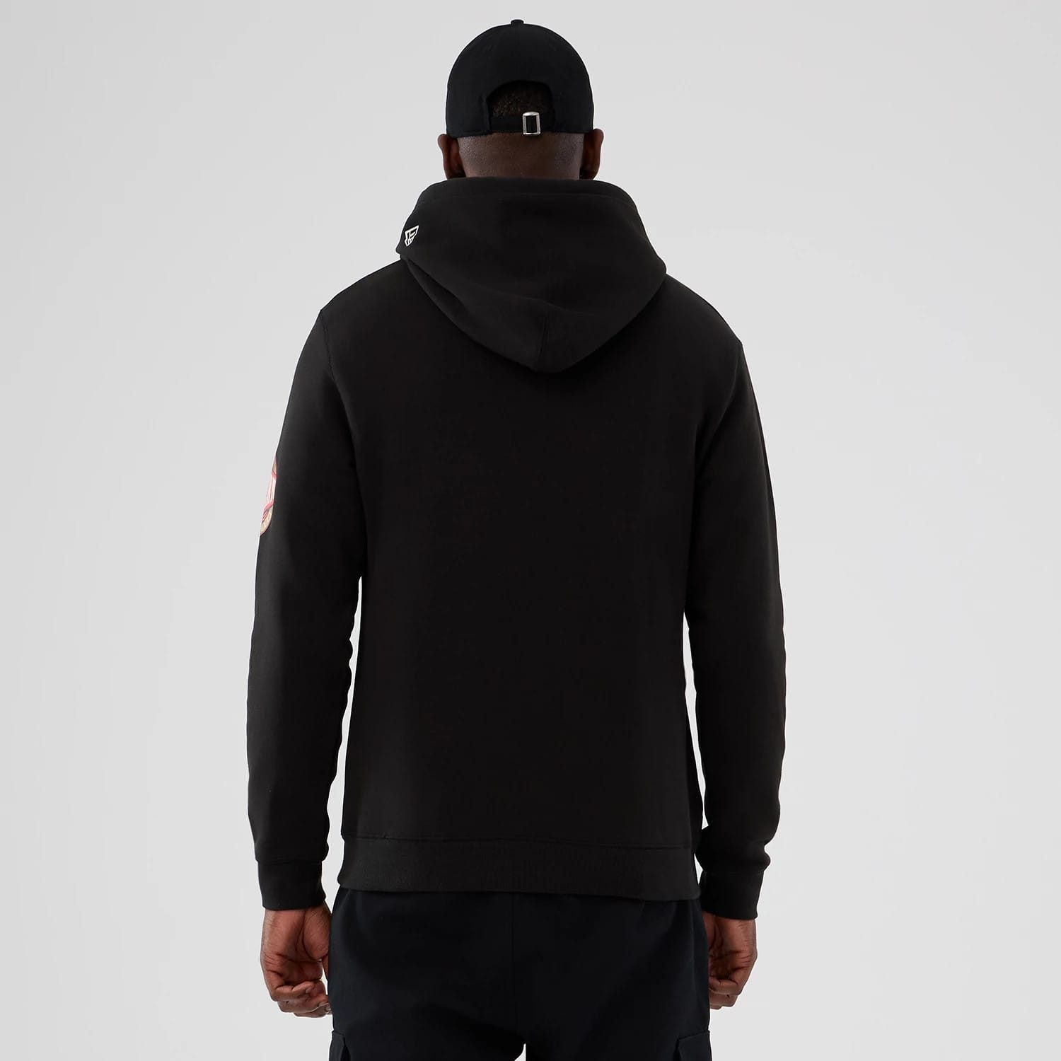 The model is wearing this NBA Hardwood Classic LA Lakers Pullover Hoodie in black. 2