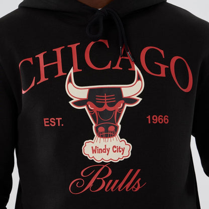 The model is wearing this NBA Hardwood Classic Chicago Bulls Pullover Hoodie in black. 7