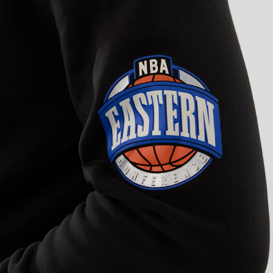 The model is wearing this NBA Hardwood Classic Chicago Bulls Pullover Hoodie in black. 5