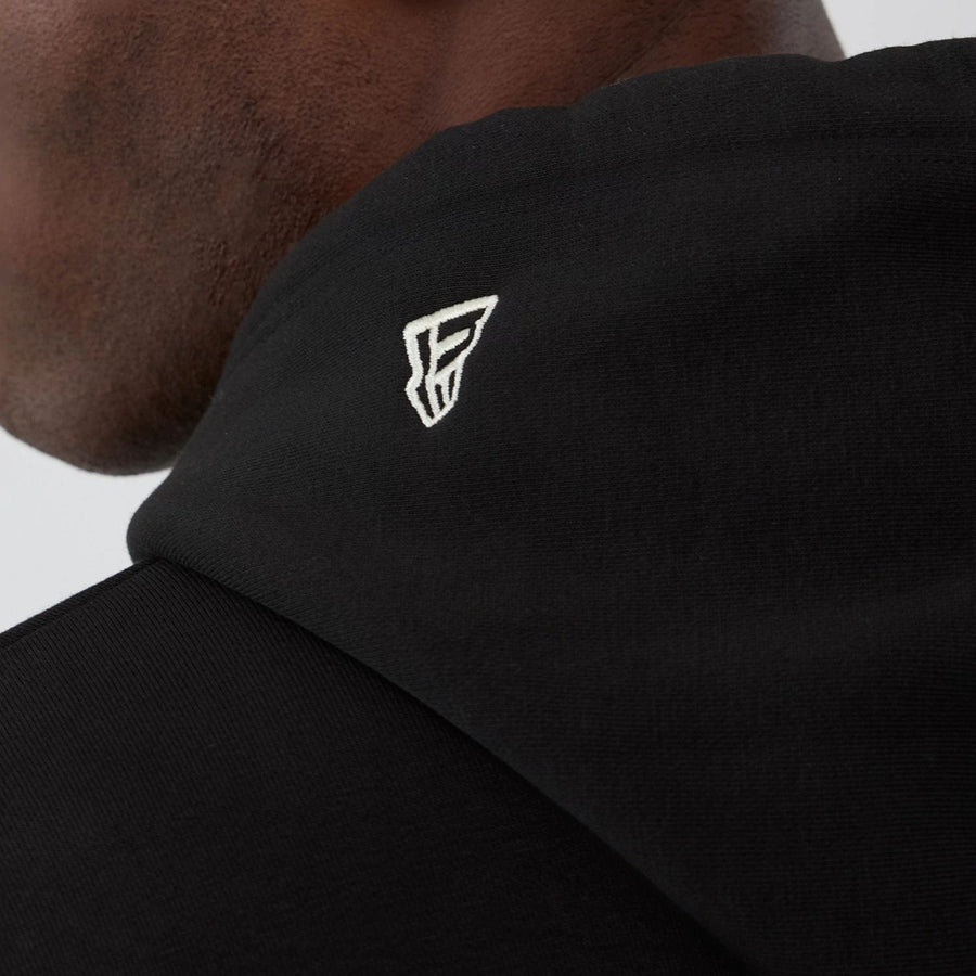 The model is wearing this NBA Hardwood Classic Chicago Bulls Pullover Hoodie in black. 6