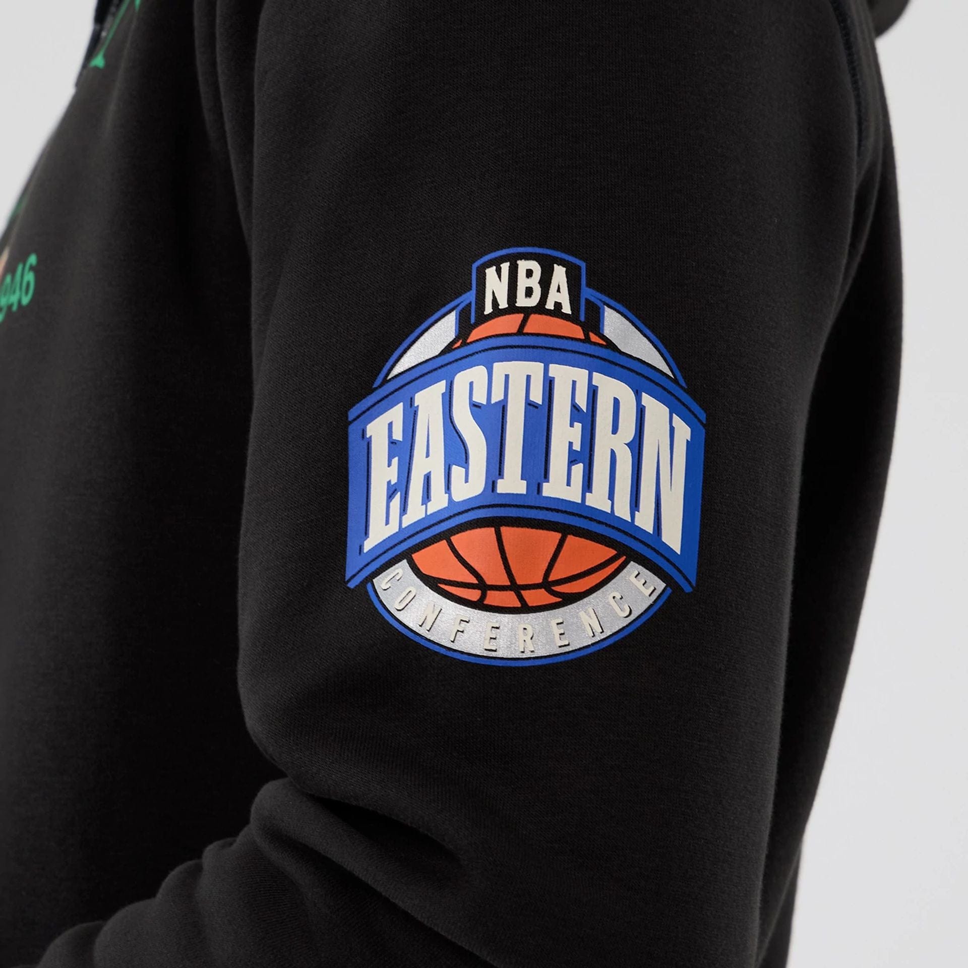 The model is wearing this NBA Hardwood Classic Boston Celtics Pullover Hoodie in black. 5