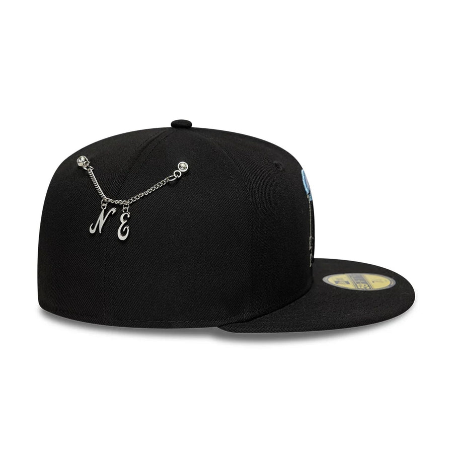 Pictured is this MLB Snow Icon LA Dodgers 59FIFTY Fitted cap in black. 2