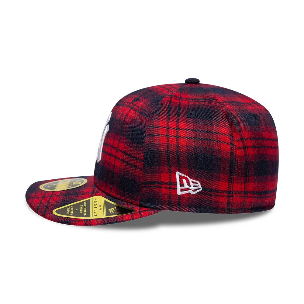 New York Yankees MLB Check Red Low Profile New Era 59FIFTY Fitted Cap, side view showing the white New Era flag logo on the left side, with a red and black check pattern and gold 59FIFTY size sticker on the flat visor.