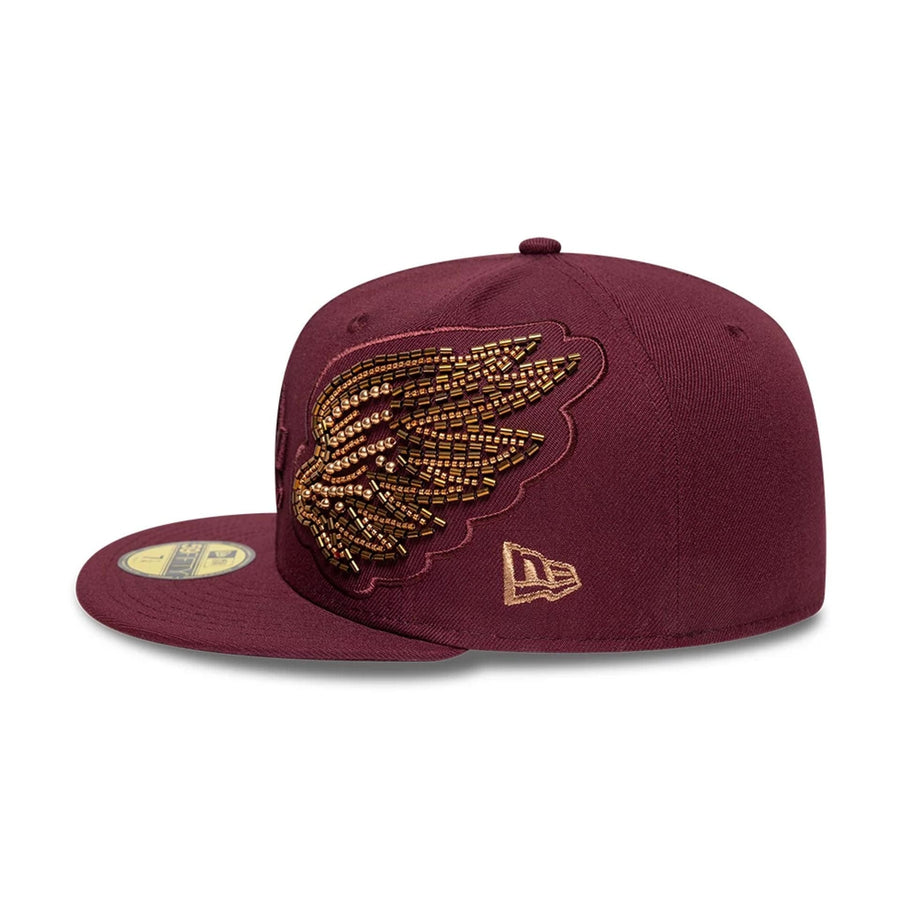 Pictured is this MLB Beaded Wings LA Dodgers 59FIFTY Fitted cap in dark red. 4