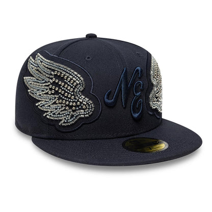 New Era Beaded Wings Navy 59FIFTY Fitted Cap, front view showing intricately beaded silver wings on the navy crown, with a raised embroidered NE logo on the front panel and a gold 59FIFTY size sticker on the flat visor.