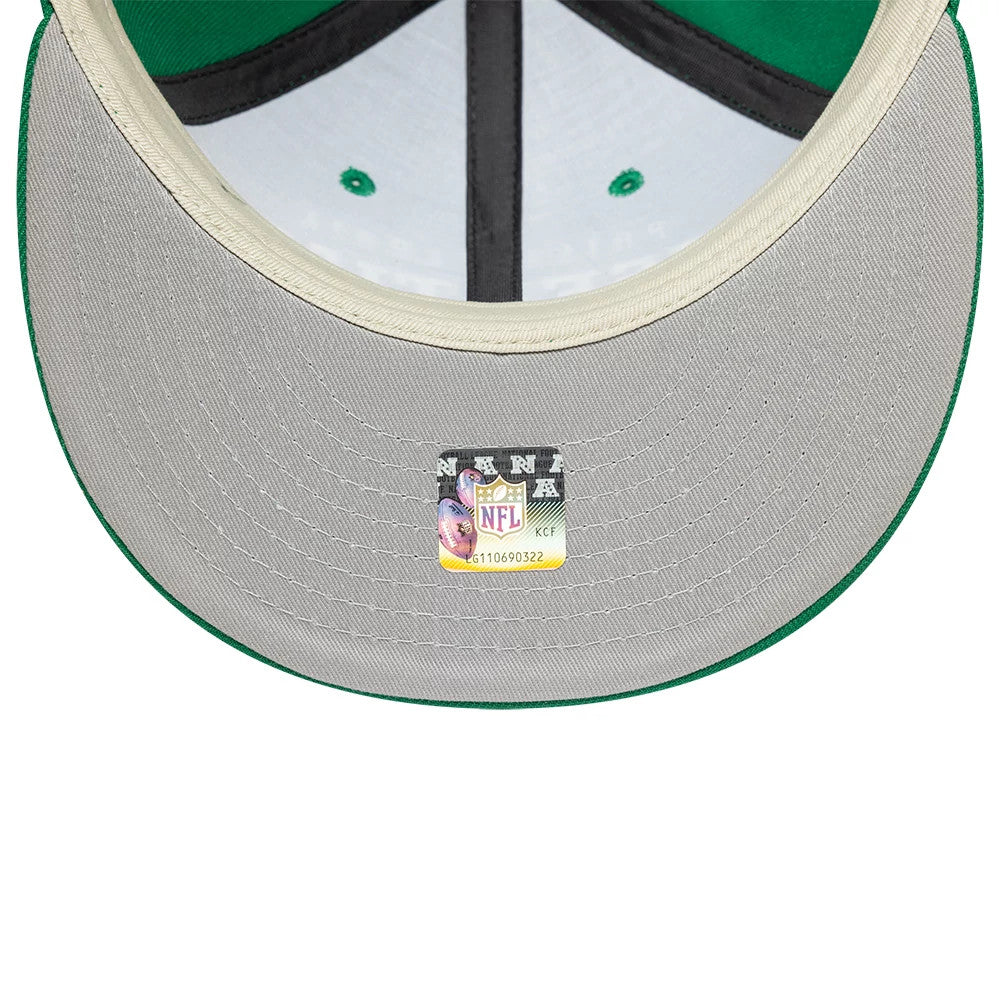Philadelphia Eagles Fear Of God x NFL Green Retro Crown New Era 9FIFTY Adjustable Cap, inside view featuring a grey undervisor with an NFL authenticity sticker, green eyelets, contrasting taping and a black sweatband along the inner rim.