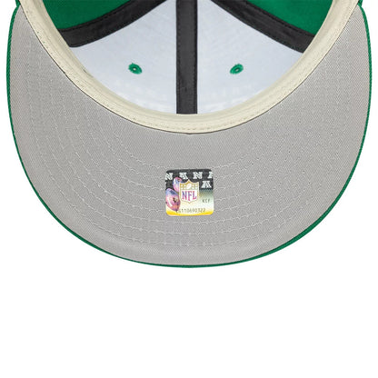Philadelphia Eagles Fear Of God x NFL Green Retro Crown New Era 9FIFTY Adjustable Cap, inside view featuring a grey undervisor with an NFL authenticity sticker, green eyelets, contrasting taping and a black sweatband along the inner rim.