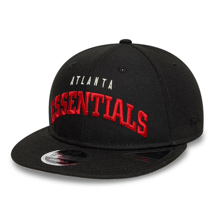 Atlanta Falcons Fear Of God x NFL Black Retro Crown New Era 9FIFTY Adjustable Cap, front view showing white and red embroidered Essentials lettering on the black structured crown, with a black curved visor featuring a 9FIFTY size sticker.