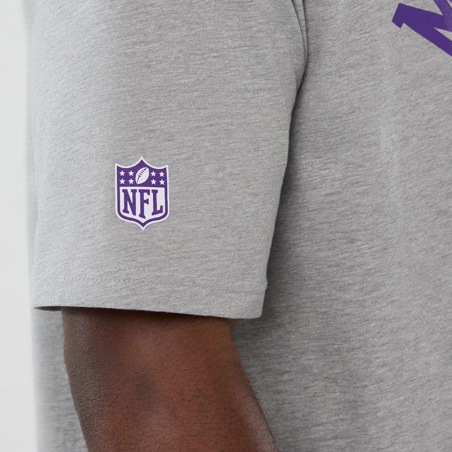 The Male model is wearing Minnesota Vikings NFL International Series Games 2025 Dublin Grey Oversized T-Shirt 5
