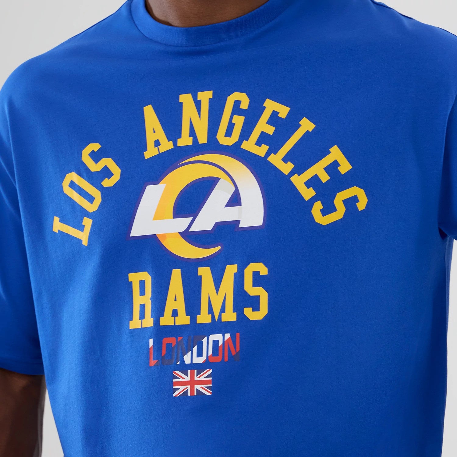 The Male model is wearing LA Rams NFL International Series Games 2025 Bright Blue Oversized T-Shirt 3