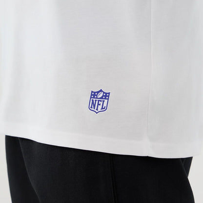 The Male model is wearing LA Rams NFL International Series Games 2025 White Oversized T-Shirt  5