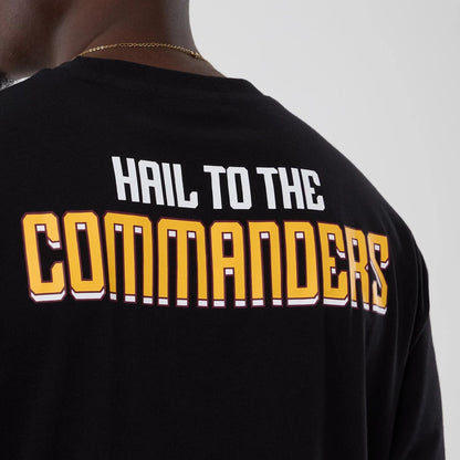 The Male model is wearing Washington Commanders NFL International Series Games 2025 Black Oversized T-Shirt  6