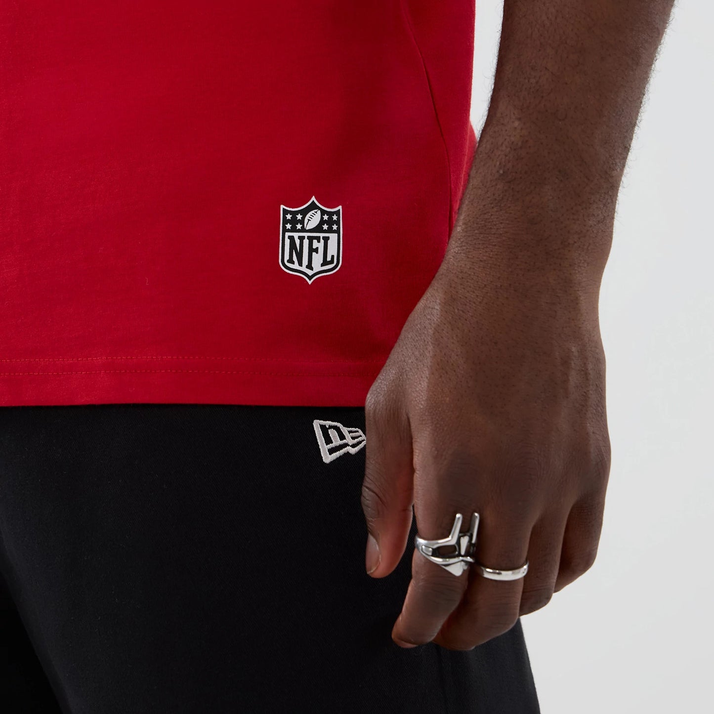 The Male model is wearing Atlanta Falcons NFL International Series Games 2025 Red Oversized T-Shirt 6