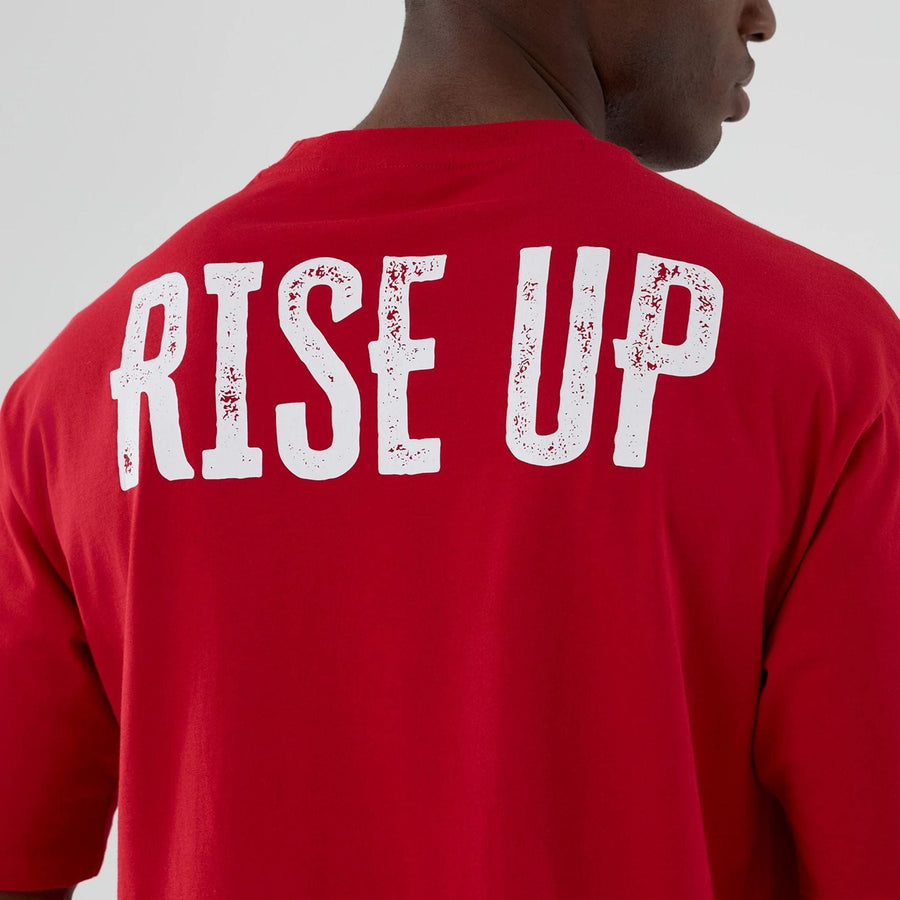 The Male model is wearing Atlanta Falcons NFL International Series Games 2025 Red Oversized T-Shirt  5