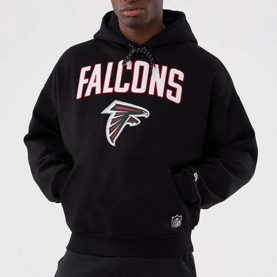 The Male model is wearing Atlanta Falcons NFL International Series Games 2025 Black Premium Pullover Hoodie  7